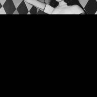 BETTIE PAGE #4 BLACK BAG PHOTO CVR (MR)